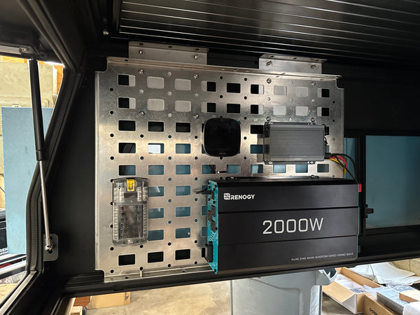 Renogy 2000W power station inside a canopy camper