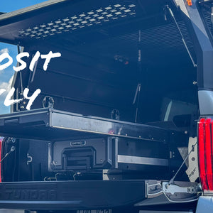 Truck with an extended cargo bed on a clear day