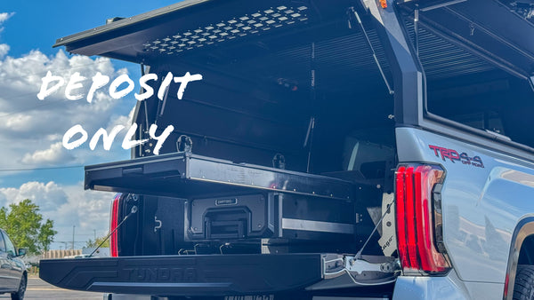 Truck with an extended cargo bed on a clear day